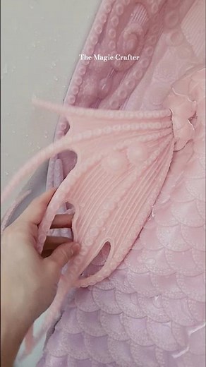A pink tail like pale moonlight