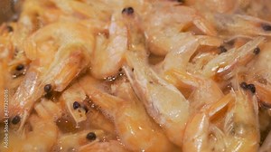 The Process of Cooking Healthy and Delicious Prawns. Boiling and Steaming Boiled Prawns, Close-up. Cooking Food. Cooking Seafood.