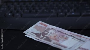 Weak kip, lao kip banknotes, Businessman's hands counting money. One hundred and fifty kip is official currency of laos. Finance and banking business in Asia, impact of global economy from virus