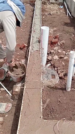 cement and sand plaster using a trowel