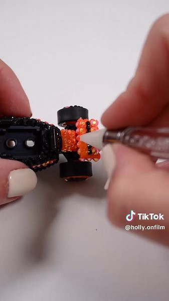 Making a bedazzled Lego F1 McLaren keychain 🧡✨ These are using those little ones that come in the blind boxes, and the rhinestones, glue and keychain kit I got online! #lego #f1 #formula1 #mclaren #legof1 #oscarpiastri #landonorris