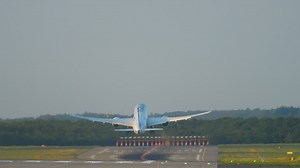Full shot of an airplane taking off the track - Free Stock Video