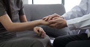 clip-1054574477-mental-health-close-up-shot-male-doctor-hands