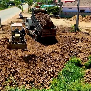 20K views · 385 reactions | The bulldozer operator expertly navigates, pushing soil into the water before unloading from the dump truck. | BulldozeR PoweR | Facebook