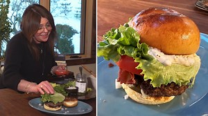 Rachael layers beef patties crispy bacon on toasted buns with onion, pickle chips, tomato, lettuce and a thick, creamy blue cheese sauce that's so good, she calls it "ridiculous." | Rachael Ray Show