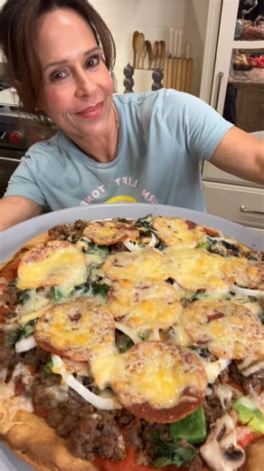 Melanie on Instagram: "Sourdough Discard 🍕Crust 1 tsp Kosterina olive oil ( link in bio ) 2 .5 c Sourdough discard - amt will depend on how large your pan is. This is Caraway’s 15’’ pizza crisper. ( link in bio for promo ) Pinch of salt Pinch of Italian seasoning Preheat oven to 425. If you use Caraway’s crisper, you don’t have to add oil to the pan. Spread evenly on the pan. Cook for 12 minutes. Remove from oven and top with traditional pizza toppings. Return and bake another 8-10 min until ch