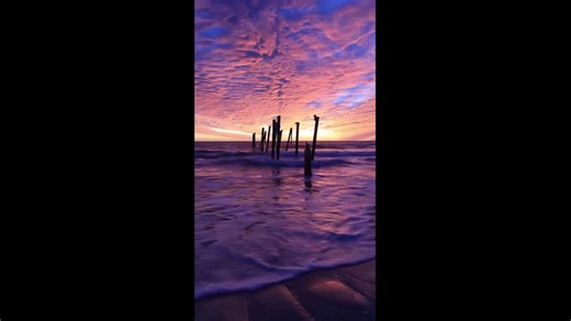 Stunning sunset over the remains of Redington Long Pier, Florida, USA