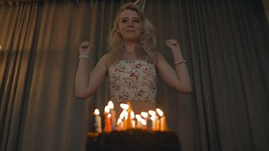 Girl blowing out birthday candles - Free Stock Video