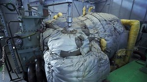 Inside a thermal power station, view of pipes and turbines, energy conversion system, environmental issues, power generation system, electrical insulation.