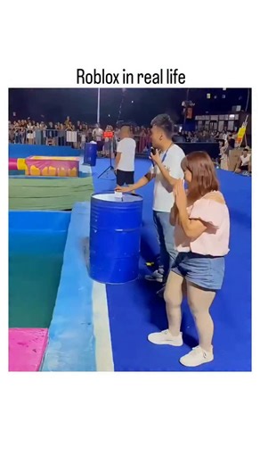 buzz__decode on Instagram: "The post shares a 88-second video compilation of contestants failing hilariously on a colorful, inflatable Wipeout-style obstacle course over a pool, captioned "Roblox in real life" to evoke the chaotic physics of the popular video game. Posted by Indonesian content creator @Tawadotcom , whose lighthearted bio encourages casual enjoyment, it exploded to 1.4 million views and 1.5k likes within hours, reflecting viral trends in fail videos that blend gaming nostalgia wi