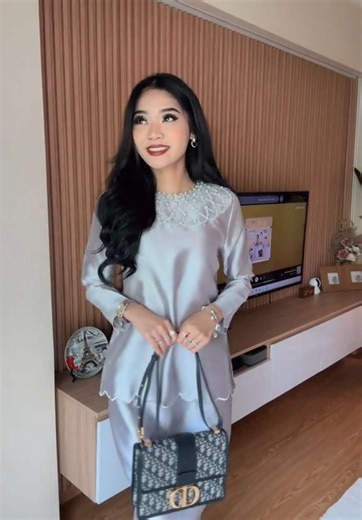 Mom and Kid Share Fun Camera Moments on Raya