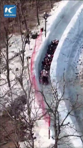 NE China's Dalian wows tourists with 1 km ice slide