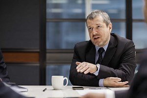 Syndication vs. Organizational Costs