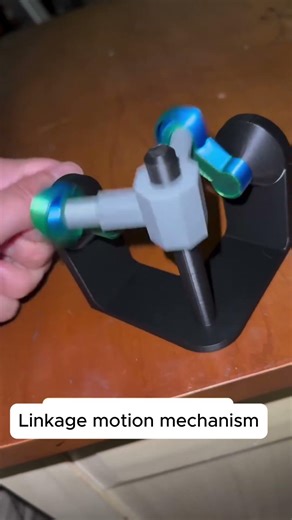 Manual linkage mechanism demonstrating rotational motion transfer #engineering