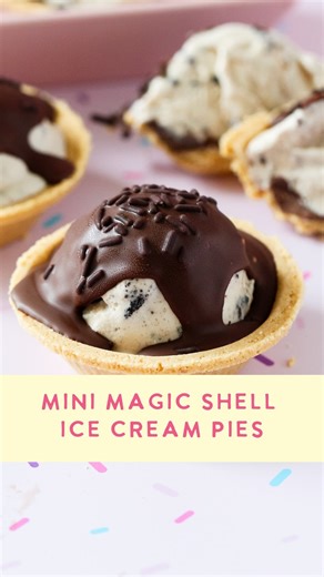 Mini Ice Cream Pies 🍦 So easy and unbelievably good. This recipe is from my summer eBook ☀️ I’ve written it below, but you can also comment BOOK for a direct link to download it! * 6 tbsp Nutella or chocolate spread of your choice * 6 mini graham cracker crusts * Approximately 3-4 cups of chocolate, vanilla, or marbled ice cream. You can also use flavors with add-ins like cookies n cream or cookie dough. * 1 bottle of milk chocolate magic shell * Sprinkles for decorating Spread 1 tablespoon of 