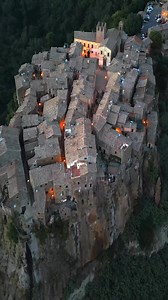 Calcata is famous for being a charming mediaeval village in Lazio, known as the "country of artists", hippies and witches, thanks to its bohemian atmosphere, the lively artistic community and the mystical legends linked to its history and its underground caves. It is also famous for its particular architecture built on the tuff rock and for having been the set of films such as Amici Miei. #italy #italia | Giorgio Teti