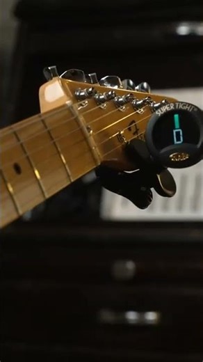 Tuning the Low E-string up from a "D" note. #guitar #guitartuner