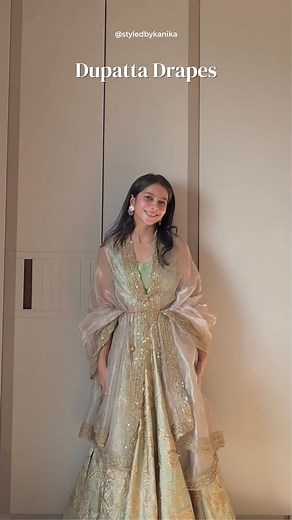 Kanika Baid | Bridal & Personal Stylist on Instagram: "Are you also tired of draping your dupatta as cape or on the shoulder always? Check these super easy and quick DIY Drapes, perfect to doll you up this festive and wedding season. Save this reel for the next time you drape your lehenga! [ lehenga drapes, diwali outfits, diwali GRWM, organza dupatta, dupatta drapes , wedding season 2024 ]"
