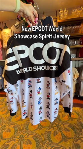 Andrea | Disney for Foodies on Instagram: "New EPCOT World Showcase Spirit Jersey just dropped! 🌍✨ Featuring Mickey in outfits from around the world 😍 📍 EPCOT 💵 $79.99 #disneyworld #disneymerchandise #disneymerch #spiritjersey #worldshowcase"