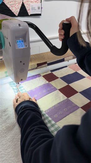 Believe it or not, this is real time quilting. The loopy meander has a really great rhythm on the longarm, and I move pretty quickly when I quilt it. In fact, it highlights *why* longarming is faster than working on a domestic— I can move a consistent weight (the machine) across a large space (the full pass of the frame) without having to do any major adjusting except shuffling my feet. On the domestic, however, I have to reset my hands and the quilt every couple of inches. Neither is better, th