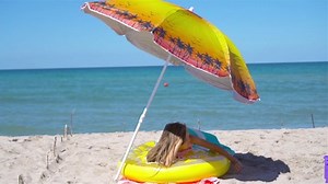 clip-1060182176-adorable-girl-relax-on-inflatable-air-mattress