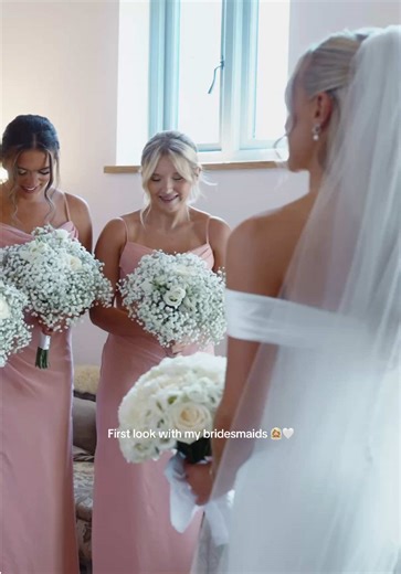 Emotional First Look Moment with Bridesmaids