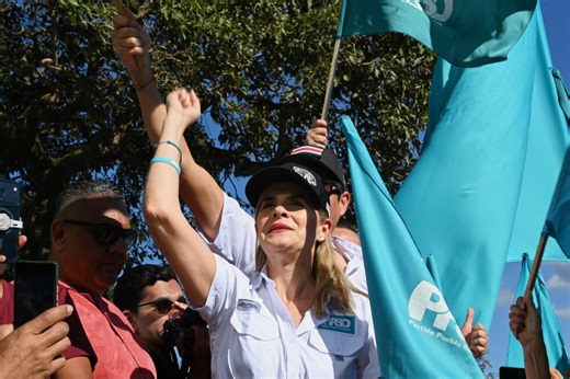 Costa Ricans vote on outgoing president's conservative populist program