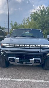 The 2025 GMC Hummer EV SUV 3X is a high-performance all-electric vehicle that blends rugged off-road capability with cutting-edge technology. The 3X trim is among the top-tier options, boasting a tri-motor setup that delivers an impressive 830 horsepower and up to 11,500 lb-ft of torque. This power allows the Hummer to accelerate from 0 to 60 mph in around 3.5 seconds, despite its large size and off-road focus. Come and experience our GMC Hummers today🔥 | Ron Marhofer Buick GMC