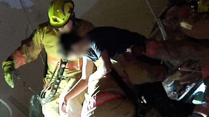 Video shows boy rescued from rubble in building collapse