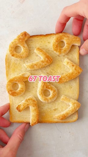 Making hot buttered toast more fun! Jumping on the viral 67 trend - just use a cookie cutter to cut out the numbers 6 and 7 out of bread. Then butter another slice and arrange your numbers on top, before toasting under the grill until golden. #67 #67food #funtoastidea #kidsrecipe #hotbutteredtoast | The Fast Foodie