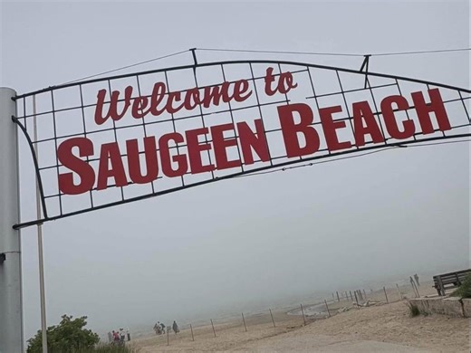 Iconic Sauble Beach sign changed overnight ahead of Canada Day