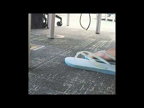 Teacher changing into flip flops during Classify Objects Lesson (extended)