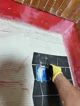 Installing shower tiles around the drain flange #diy #construction #bathroom