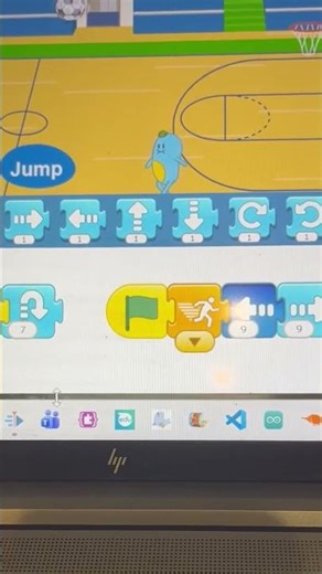Program a jumping game on a basketball court using Scratch Jr., using a button and messages.