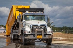 Forever Clean, a company based out of Eastern North Carolina, relies on its #MackGranite fleet to provide exceptional customer service. 🙌🚚 They utilize their Granite trucks within the company's roll-off dumpster division -- working in construction, demolition, and remodeling throughout their service area. | Mack Trucks