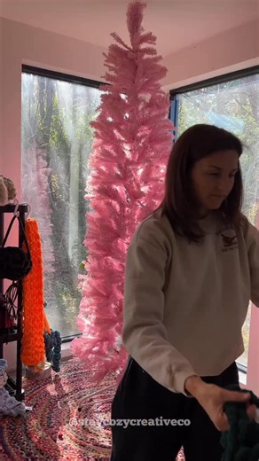 It’s try on time! I still have a few rows to go, but I just shared a video over on my YT channel of how I added the most recent round of pine green 🌲 This tree skirt will end up in my home, under our traditionally green tree, which is shorter and wider than my pink tree. I think the current size of the skirt is perfect for this tree, but it needs to be a bit bigger for my other tree 🎄 🧶 Shop this chenille yarn at StayCozyCo.com Stay cozy, Jess #handcrochet #treeskirt #cozychristmas #handmadec