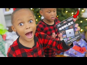 OPENING PRESENTS ON CHRISTMAS MORNING *she couldn't believe what we got her* | The Beast Family
