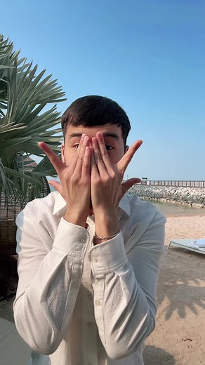 Sign Language Gestures on a Tropical Beach