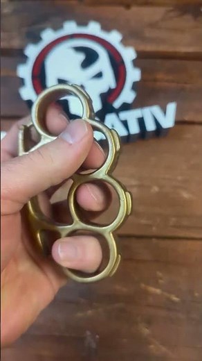 Gold Plastic Knuckle Duster - Lightweight Power!