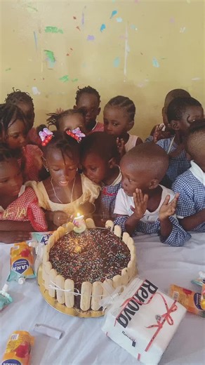 Joyful Children's Birthday Celebration with Colorful Cake