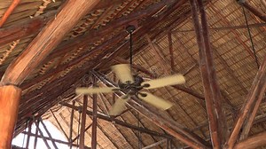 Big Fan Hanging from the Ceiling Spinning with a Straw Roof in the Caribbean Stock Footage - Video of tourism, design: 241679958