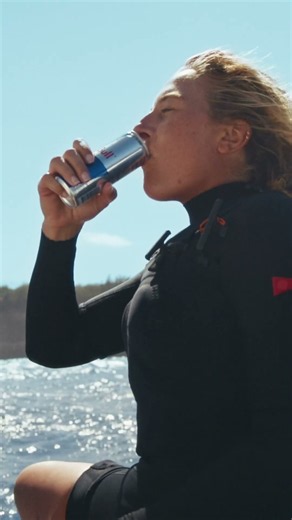 Izzi Gomez sharing waves at Jaws with Kai Lenny #redbull #surfing