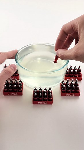 1.4M views · 8.9K reactions | How many bottles went into the slime?!  Mixing coco-cola bottles into clear slime! #slimevideo #slime #satisfyingvideo #oddlysatisfying | Dalton James | Facebook