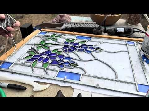 In my backyard, soldering a leaded stain glass window.🌞🌞￼