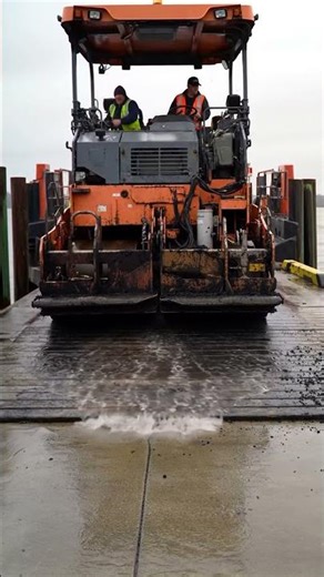 Heavy compactor boarding a ferry with vibrations on. #compactor
