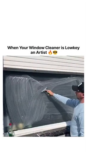 Explore World on Instagram: "The post showcases a viral video of a window cleaner using a squeegee to draw precise brand logos like Nike, Coca-Cola, and Snapchat on soapy glass, set to motivational clips from Muhammad Ali and Marianne Williamson, highlighting everyday artistry. Shared by Spanish content creator Guille Martín (@Farmaenfurecida ), a former pharmacist turned social media personality, it has exploded to over 3 million views, underscoring public fascination with unrecognized talent i