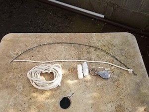 Raising a Dipole Antenna Feed-point with Rope and Pulley.