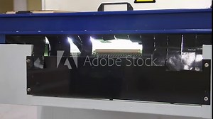 Laminated floor production line. Factory for the production of parquet board. Modern industrial factory. Furniture factory production line. Gluing laminate to a wooden base under pressure and heat. Stock Video