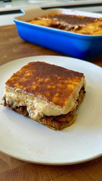 Conor Curran on Instagram: "🍆 let’s build a MOUSSAKA… FOR THE RECIPE: Type the word ‘MOUSSAKA’ in the comment section my lemon wedges or head to creamyconfusion.com.au (Link via bio). . . . #moussaka #eggplant #greekfood #greekcooking #bake #traybake #comfortfood"