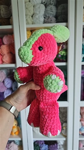 3.1K views · 302 reactions | I wanted to make a bright colored dinosaur this summer and I'm just getting around to finishing it! This is Mini Parker the Parasaurolophus in Parfait Chunky.  I love the result. It kind of gives watermelon vibes don't you think?  #thenicolechase #miniparkertheparasaurolophus #crochetdinosaur #amigurumi #crochetpattern #amigurumiartist | Nicole Chase Crochet Patterns | Facebook